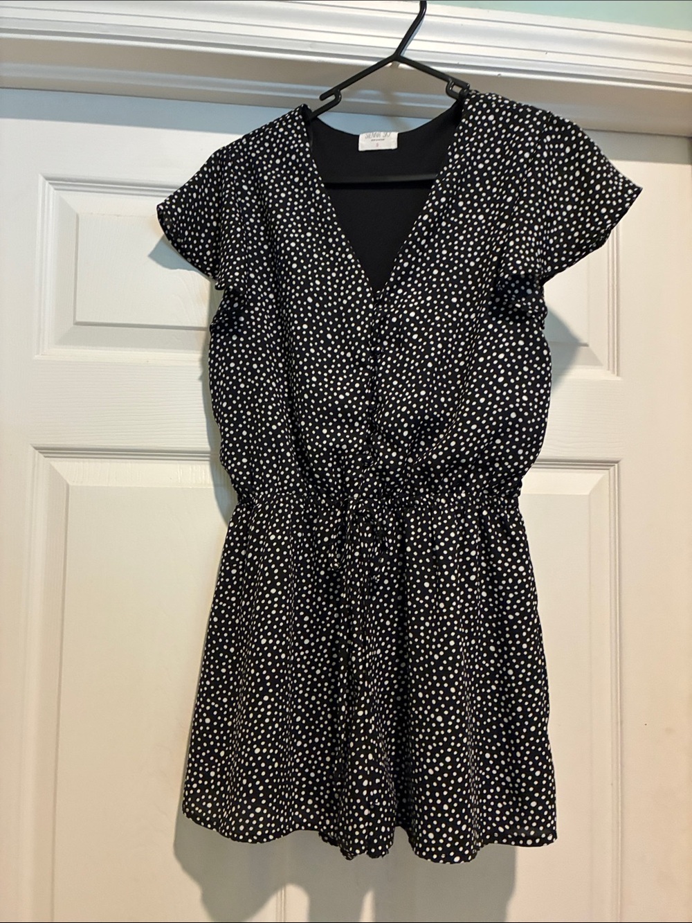Sienna Sky Black and White Polka Dot V-Neck Romper